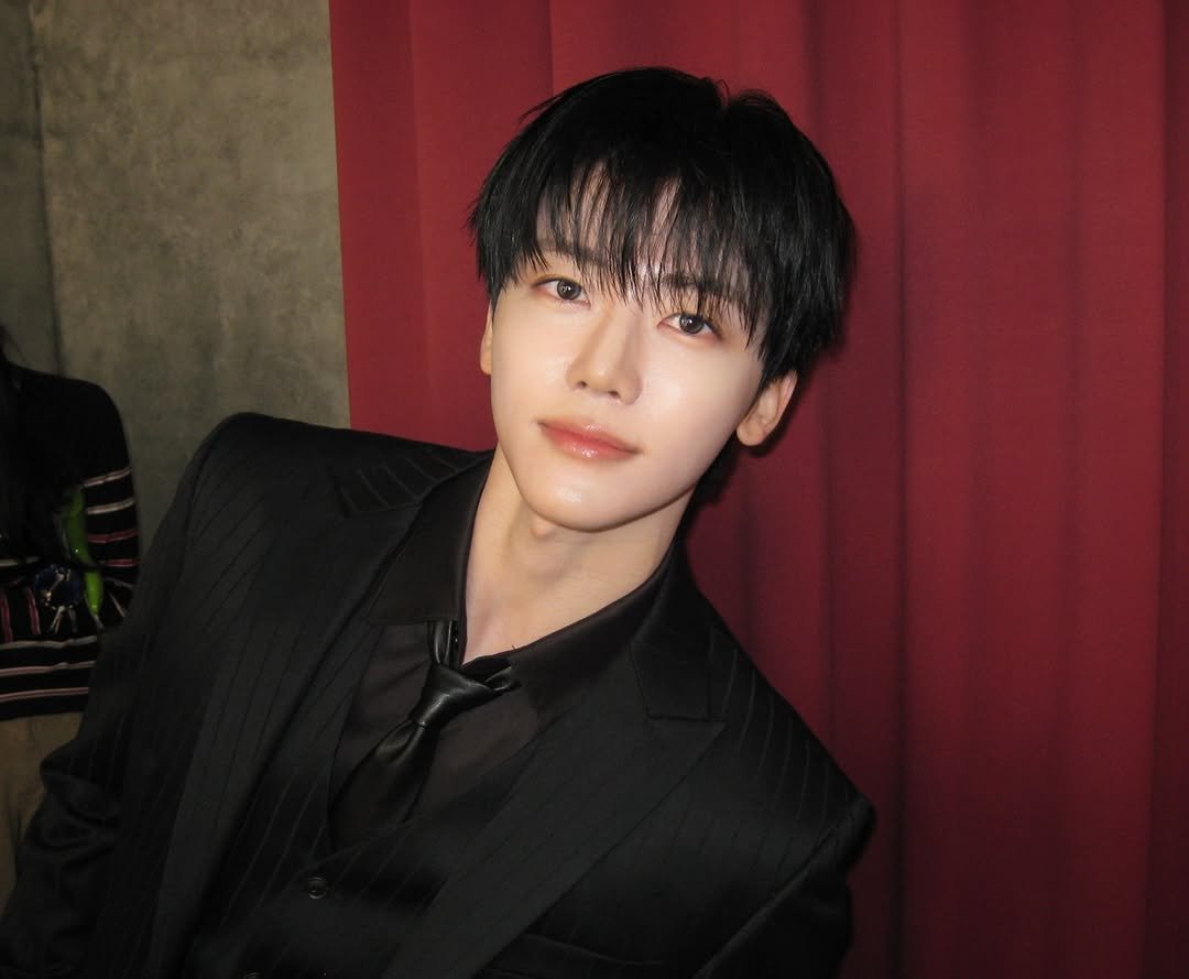 Photo by JAEMIN on December 19, 2025. May be an image of one or more people, bangs, bolo tie and text.