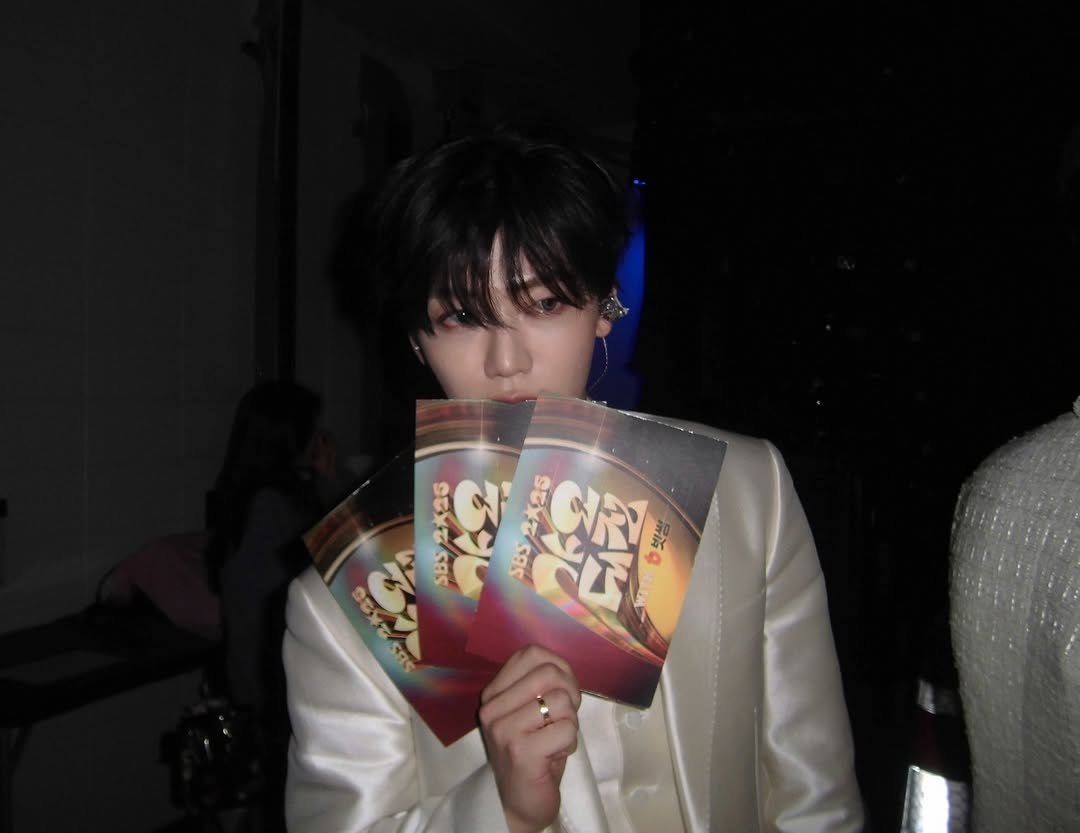 Photo by JAEMIN on December 28, 2025. May be an image of one or more people, bangs, magazine, bolo tie and text.