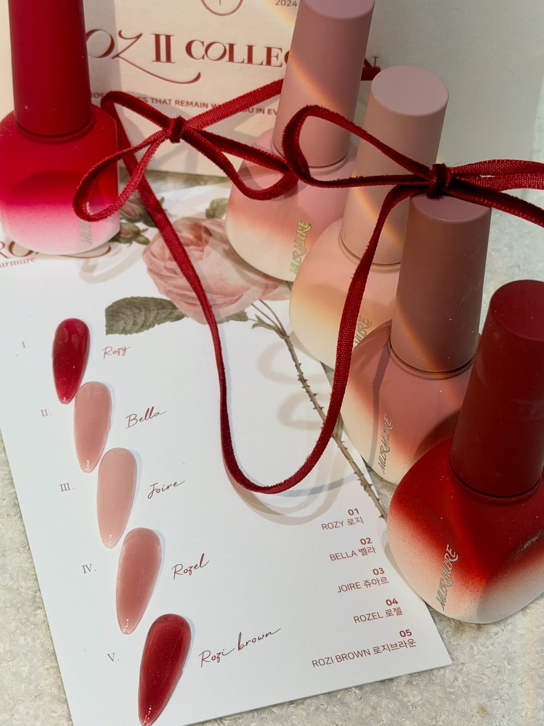 Photo by * ﻿﻿ℕ𝕒𝕚𝕝, 𝕀𝕝𝕒𝕟𝕘[네일,일랑] 부평네일|송도네일|청라네일|연장네일|스톤네일| on December 23, 2025. May be an image of one or more people, fingernails, makeup, lipstick, cosmetics and text that says '2024 yII ICOLLE COLLE THAT REMAIN BOUINE rmure มิดาาริค Rory Bella lla Be III Foire や IV 01 ROZY 모지 02 BELLA 벌라 Rogel 03 JOIRE JE쥬아르 쥬아르 04 ROZEL 로젤 05 ROZI BROWN 로지브라운 brown Rozi'.