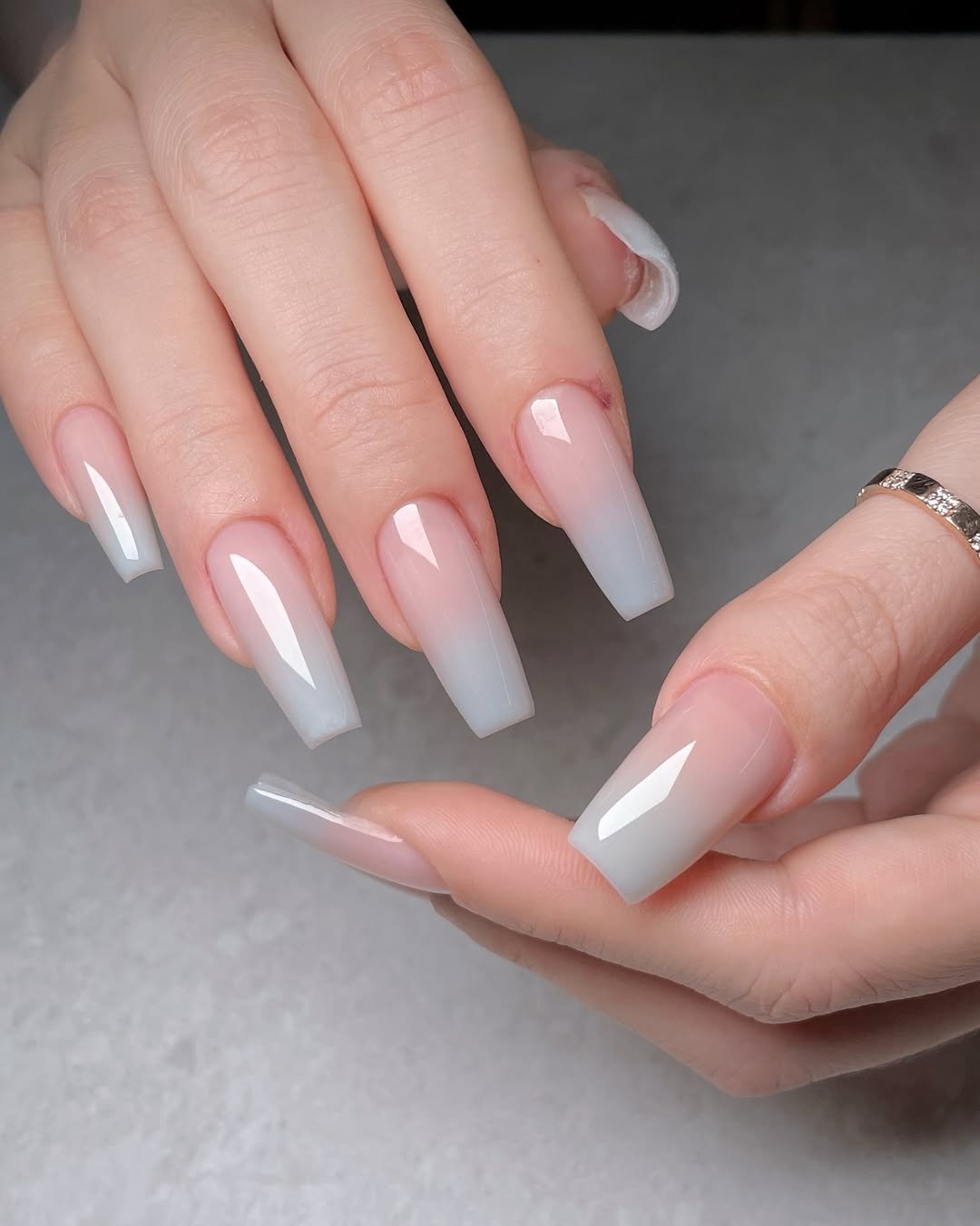 Photo shared by 네일루화 - 망원네일 합정네일 홍대네일 on April 24, 2026 tagging @nailbayo. May be an image of one or more people, fingernails and text.