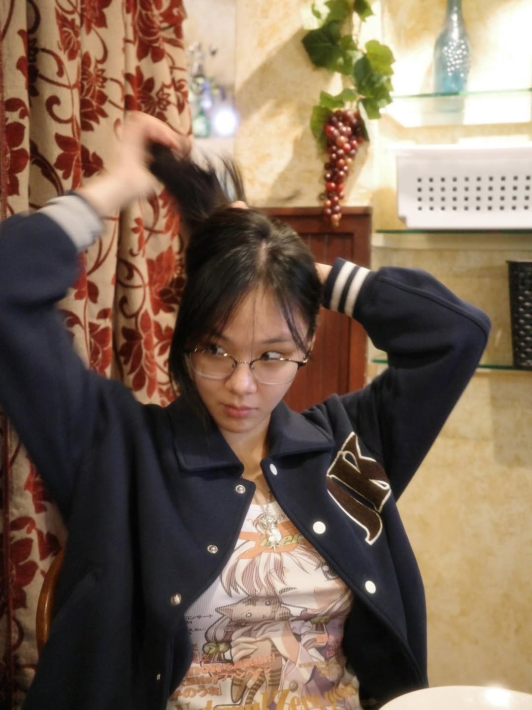 Photo by 비비 on December 17, 2025. May be an image of one or more people, bangs, bath robe and flight jacket.