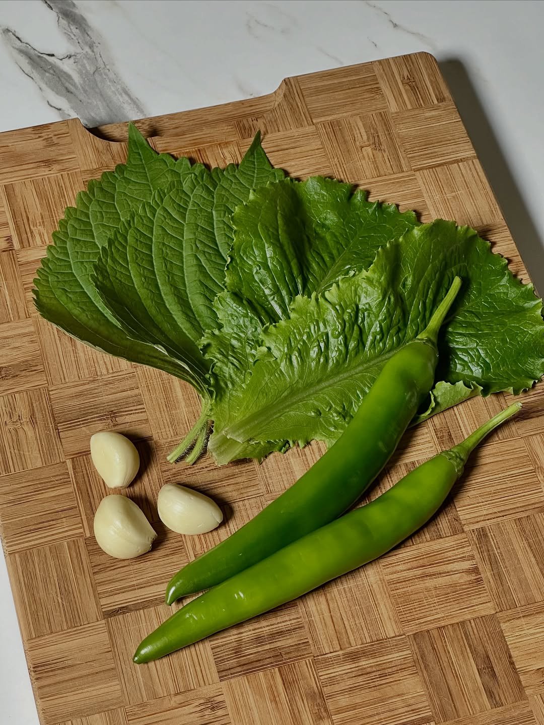 Photo by NamCook 남쿡 on October 29, 2025. May be an image of Perilla and text.