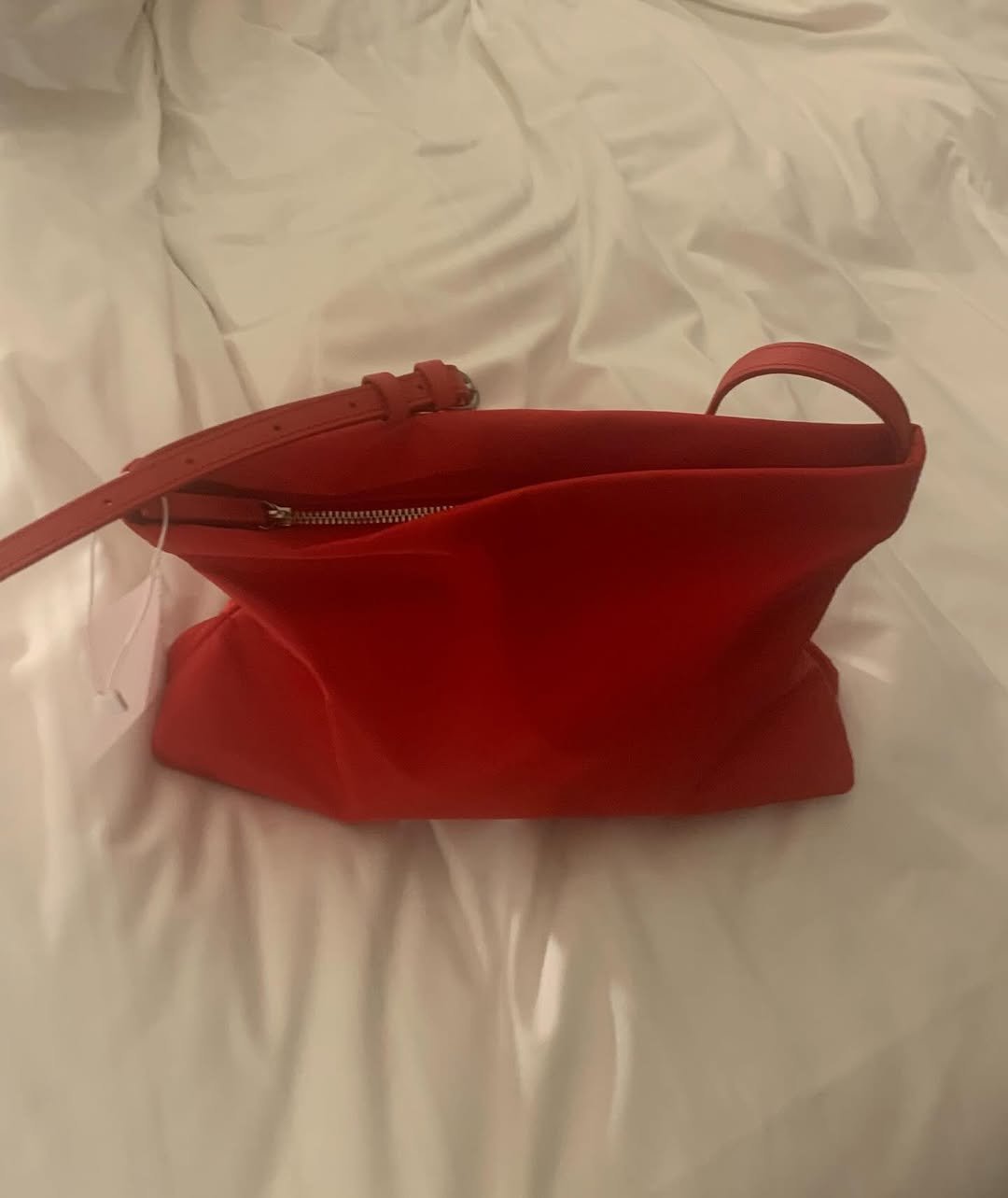 Photo by 데얼즈 on February 19, 2026. May be an image of pouch, purse, clutch and text.