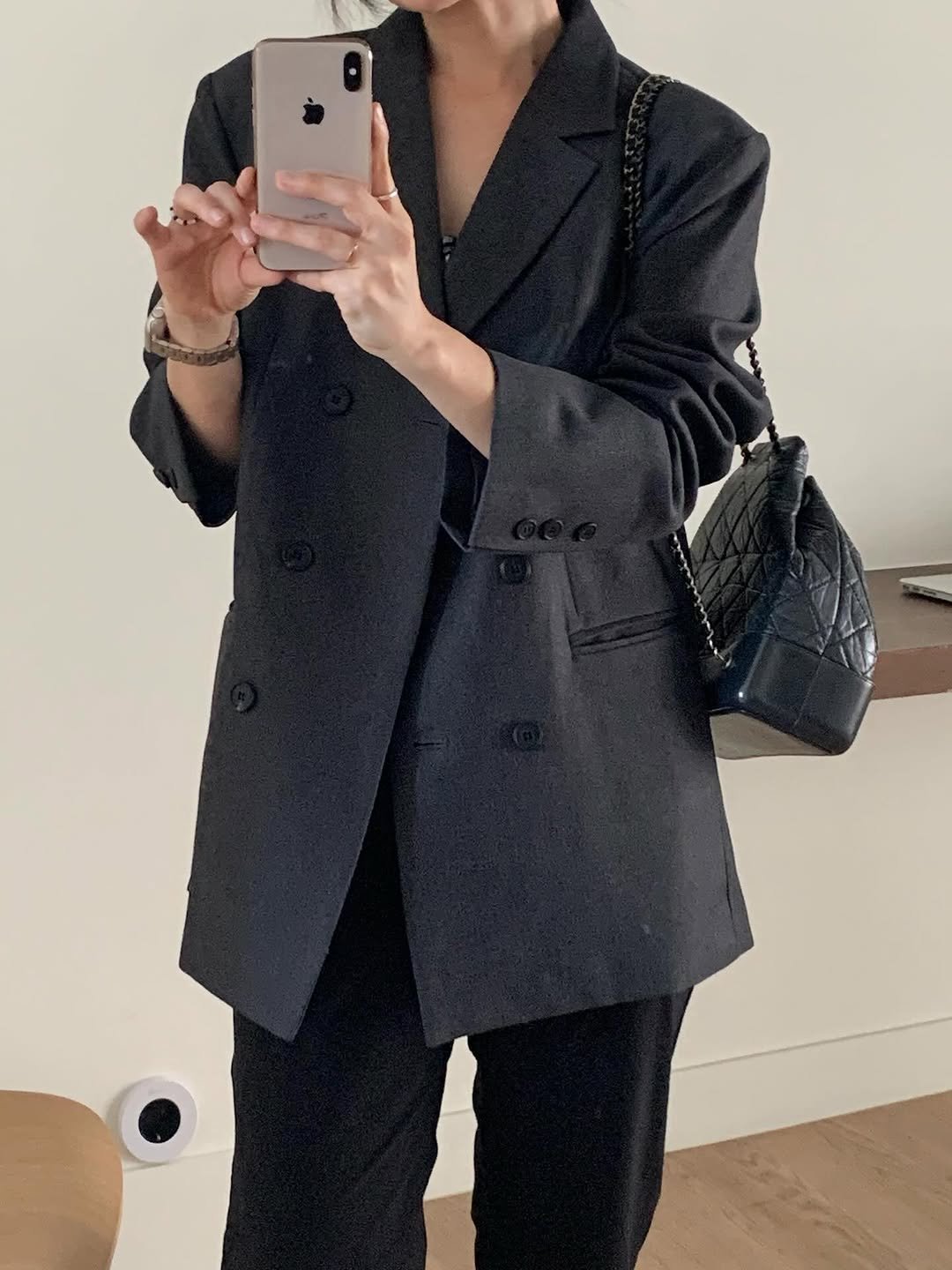 Photo by 남포동데얼즈 on August 06, 2025. May be an image of 1 person, overcoat, blazer, suit and text.