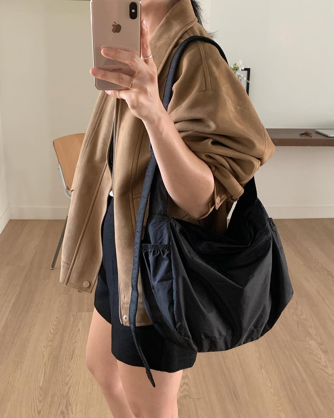 Photo by 남포동데얼즈 on July 29, 2025. May be an image of 1 person, sling, drawstring and text.
