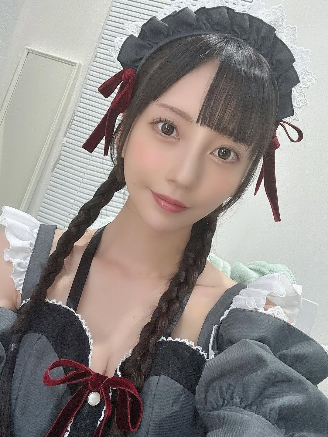 Photo by 七沢みあ on December 11, 2025. May be an image of one or more people, braids, dirndl, costume and text.