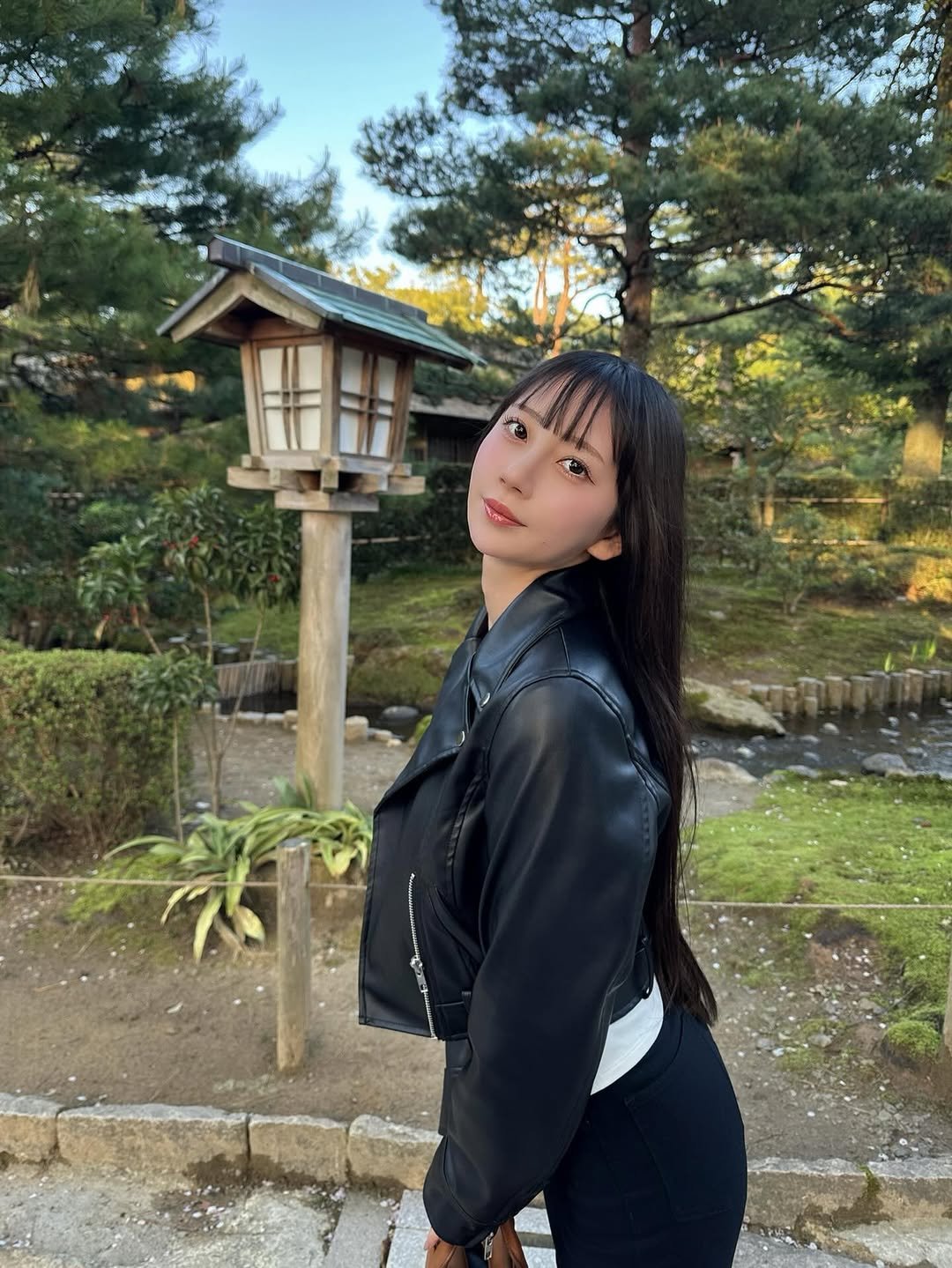 Photo by 七沢みあ on April 16, 2026. May be an image of jacket, Fushimi Inari Taisha, outdoors and text.