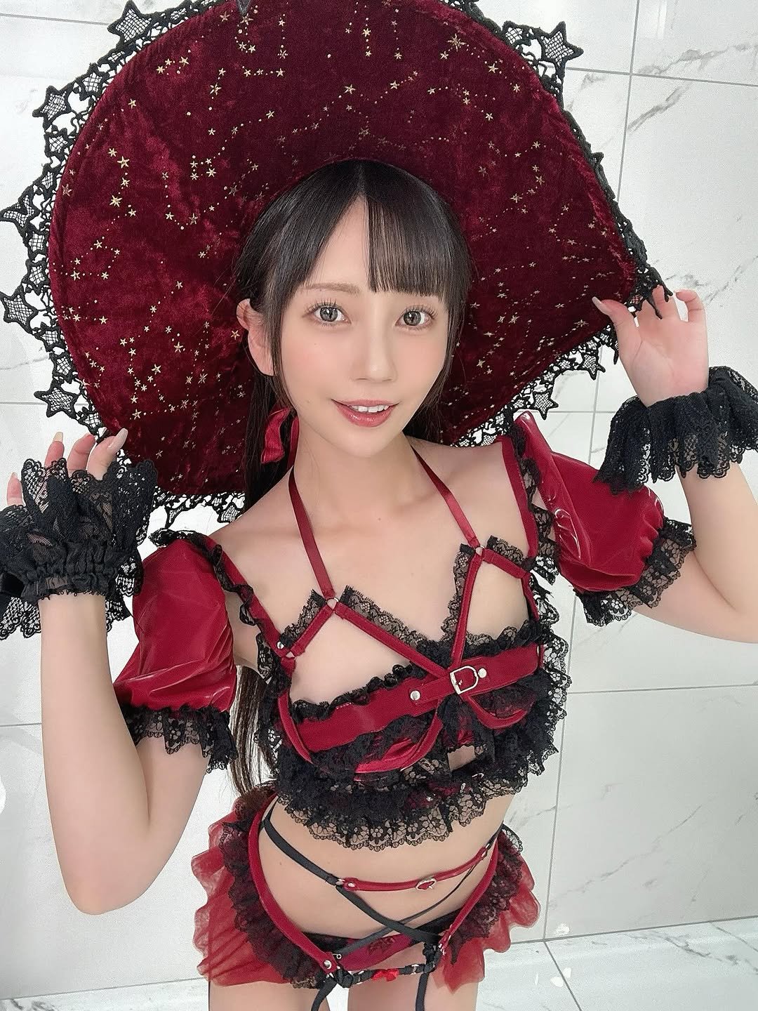 Photo by 七沢みあ on November 04, 2025. May be an image of costume, parasol, headdress and text.