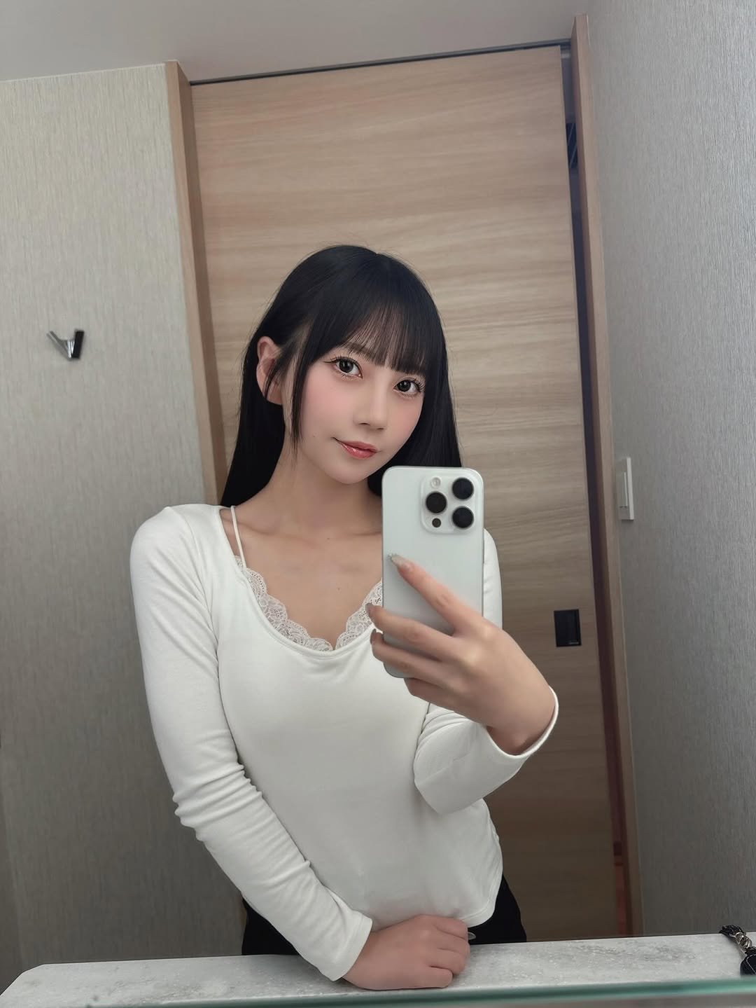 Photo by 七沢みあ on April 11, 2026. May be a selfie of one or more people, hair, top, mirror and text.