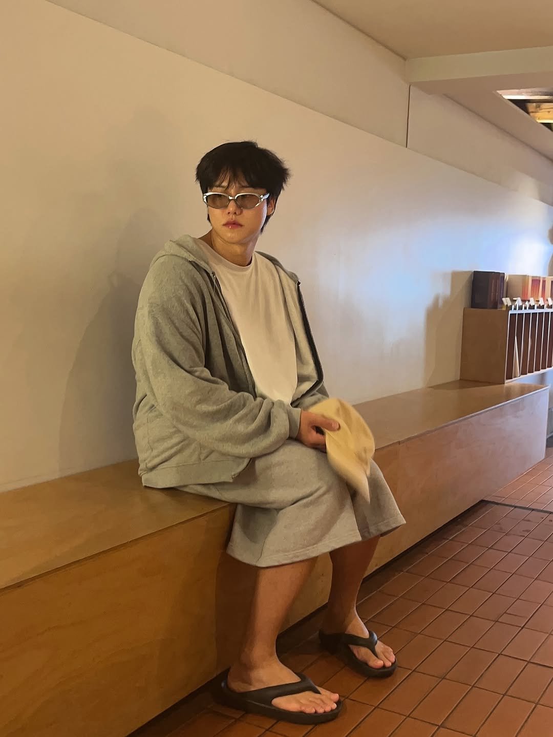 Photo by 난희 on October 06, 2025. May be an image of 1 person, sleepwear, robe, bath robe and text.