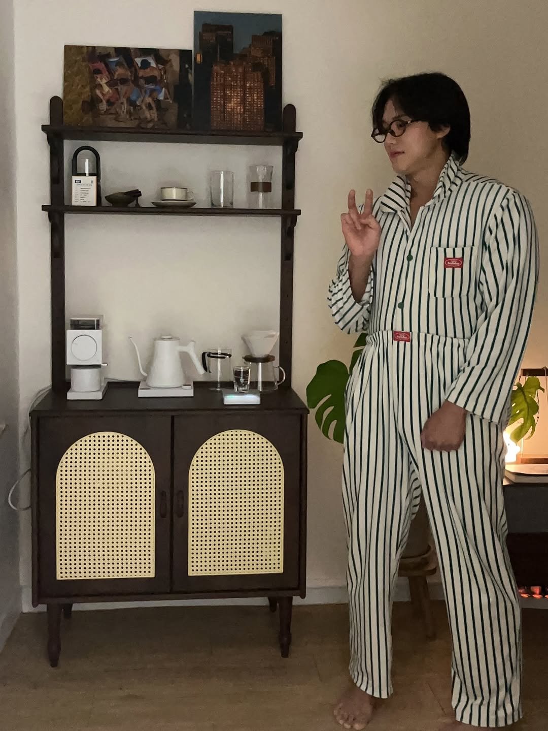 Photo by 난희 on December 03, 2025. May be an image of sleepwear, robe, sweatpants, bath robe and text.