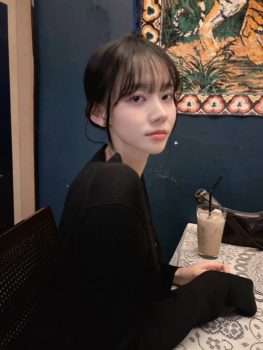 Photo by 박서진 on February 23, 2026. May be an image of one or more people, hair, turtleneck and text.