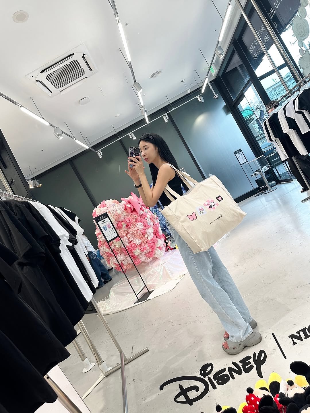 Photo shared by 손나래 on July 09, 2025 tagging @nicknicole_official. May be an image of 1 person, mirror and text.
