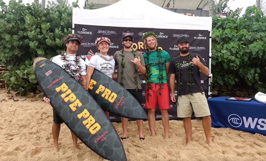 Photo shared by Nathan Florence on December 22, 2025 tagging @john_john_florence, @rissmoore10, @wsl, @elihanneman, @ivanflorence_, and @florence_marine_x. May be an image of surfboard and text.