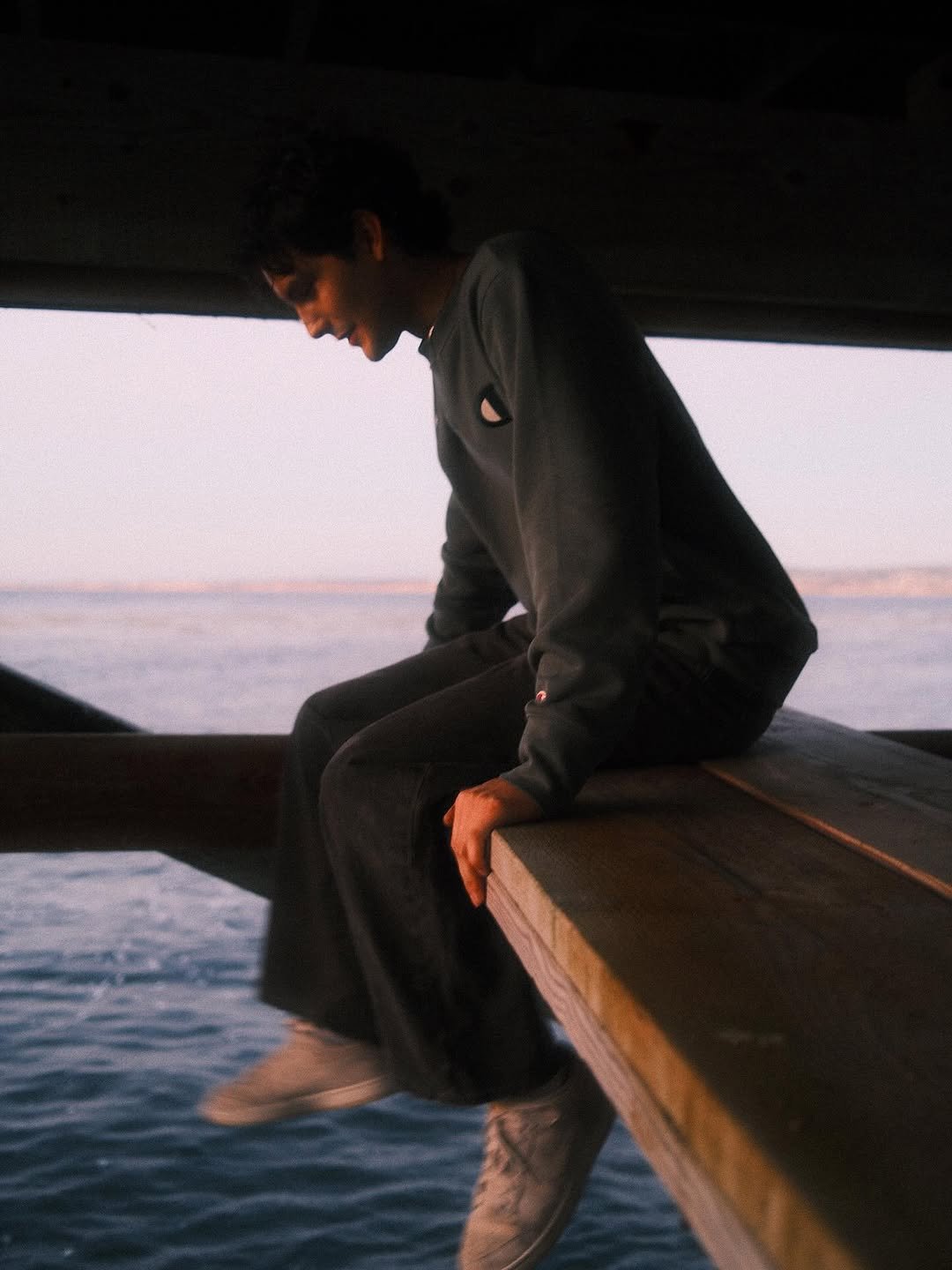Photo by Nathan Espinoza on August 20, 2025. May be an image of 1 person, ocean and text.