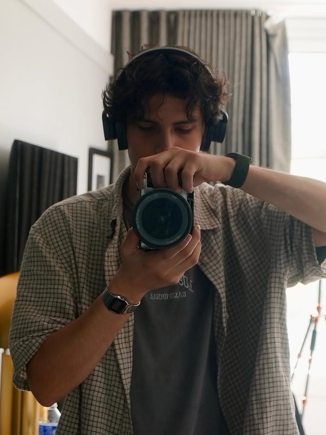Photo by Nathan Espinoza on July 12, 2025. May be an image of phone, wrist watch, camcorder, camera, mirror and portable cassette player.