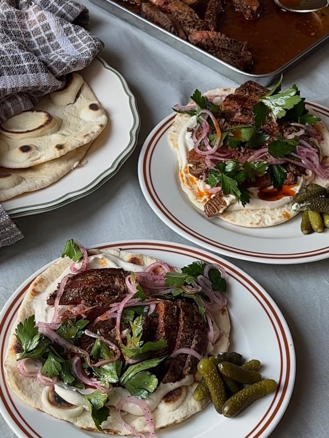 Photo by Natalia Rudin on February 26, 2026. May be an image of gyro, taco and text.