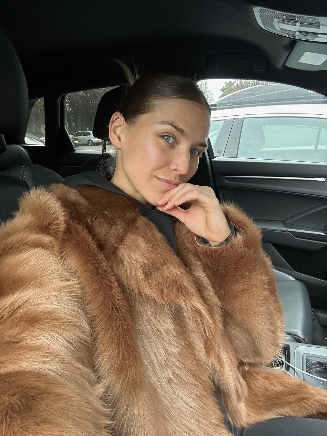 Photo by Natalia Rudin on December 29, 2025. May be a selfie of one or more people, sable coat, seatbelt, parka and text.