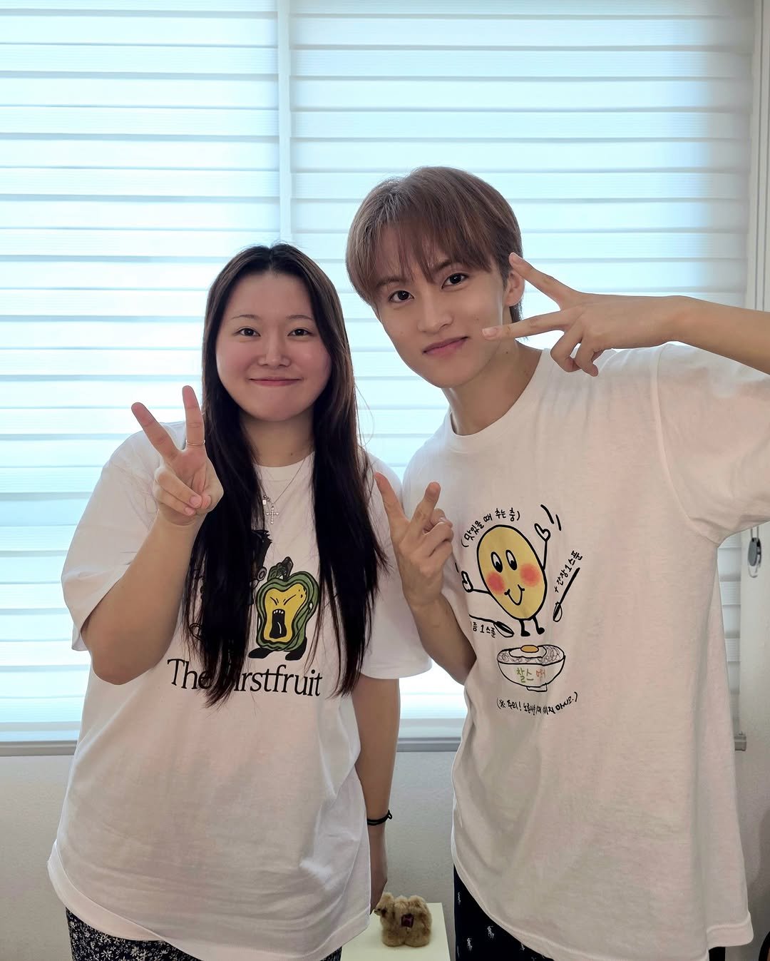 Photo shared by NCT Official Instagram on August 12, 2025 tagging @charles_is_loved, and @onyourm__ark. May be an image of 2 people, bangs, top and text.