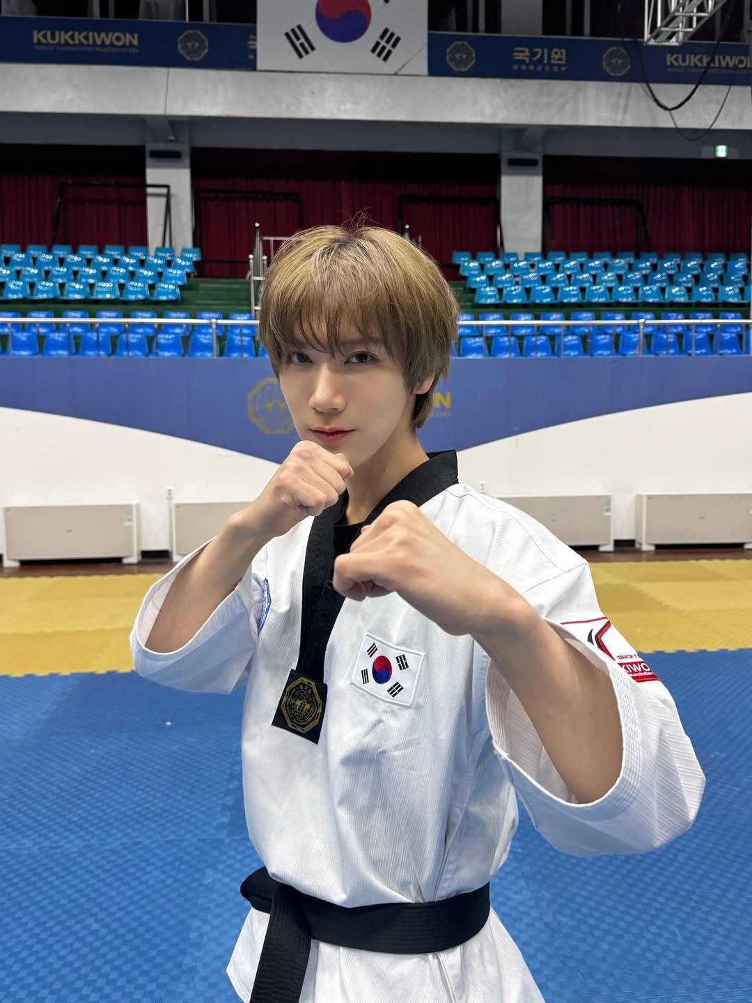 Photo shared by NCT Official Instagram on April 25, 2026 tagging @tenlee_1001. May be an image of martial arts and text.