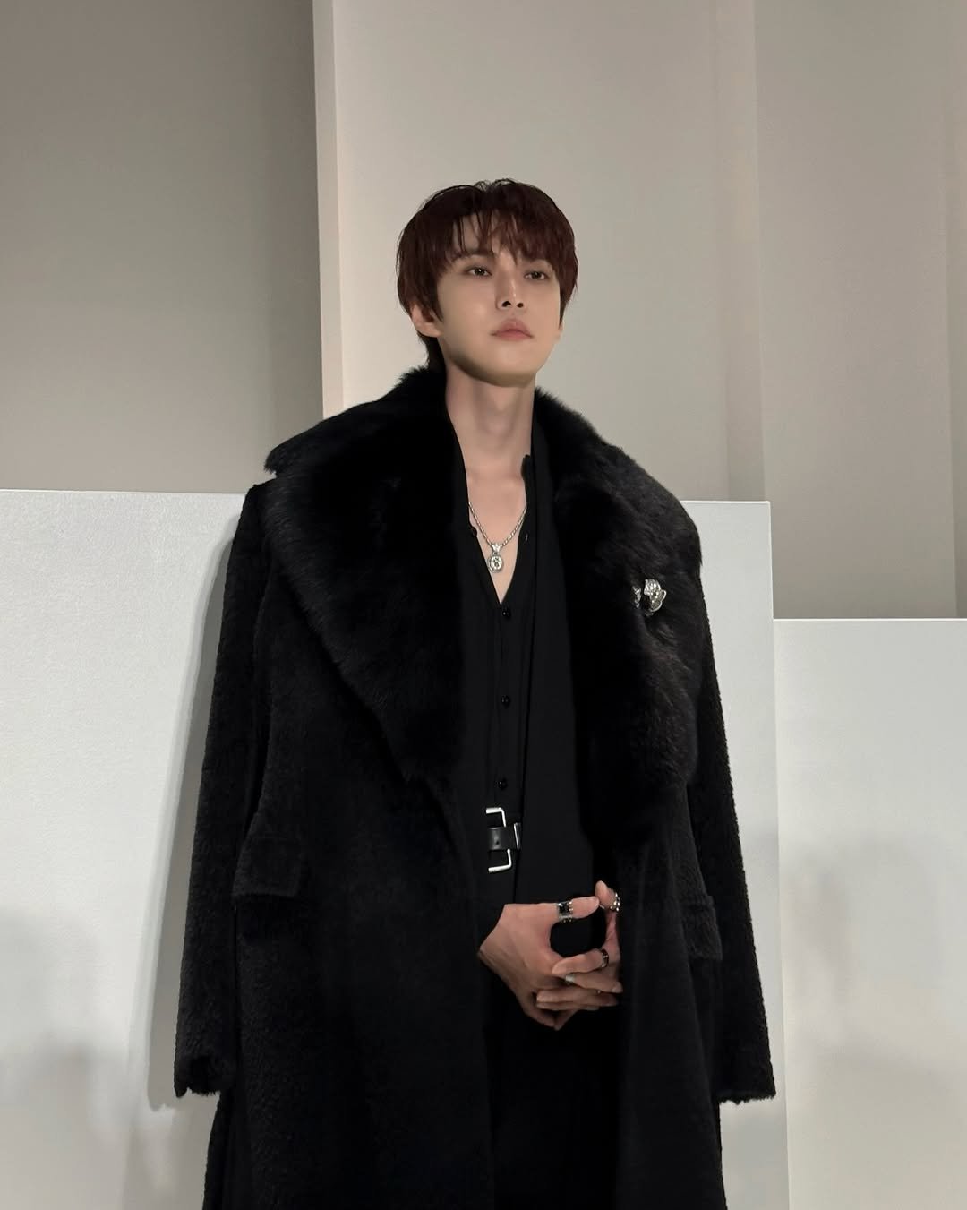 Photo by NCT Official Instagram on September 27, 2025. May be an image of 1 person, duffle coat, goosedown coat, overcoat, parka, bolo tie and text.