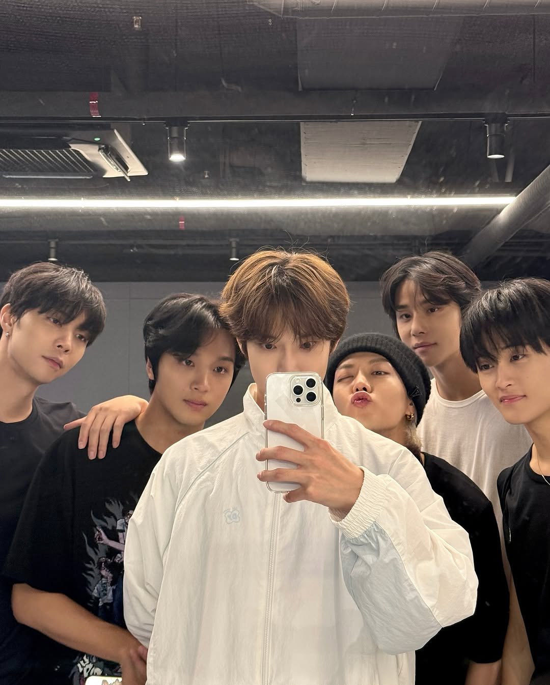 Photo shared by NCT 127 Official Instagram on September 17, 2025 tagging @yuu_taa_1026, @johnnyjsuh, @do0_nct, @onyourm__ark, @haechanahceah, and @sugaringcandy. May be an image of 3 people and text.