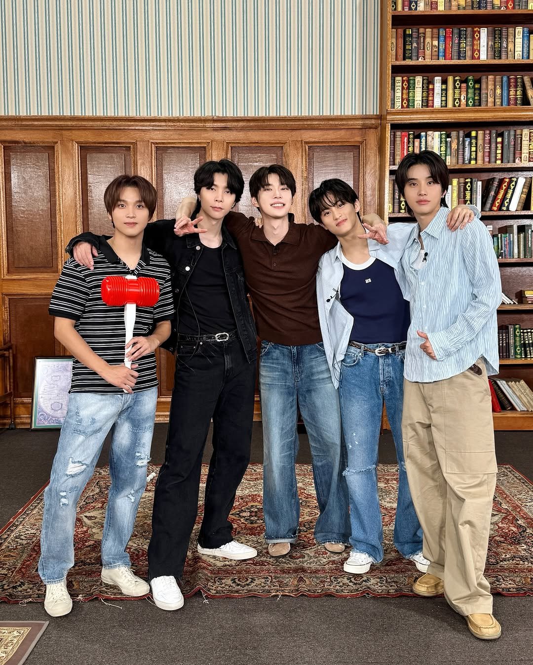 Photo shared by NCT 127 Official Instagram on July 28, 2025 tagging @johnnyjsuh, @do0_nct, @onyourm__ark, @haechanahceah, and @sugaringcandy. May be an image of 3 people, bangs and text.