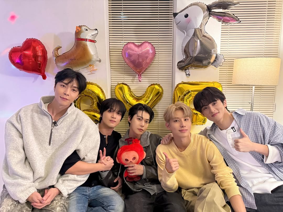 Photo shared by NCT 127 Official Instagram on December 07, 2025 tagging @johnnyjsuh, @do0_nct, @onyourm__ark, @haechanahceah, and @sugaringcandy. May be an image of one or more people, bangs and text.