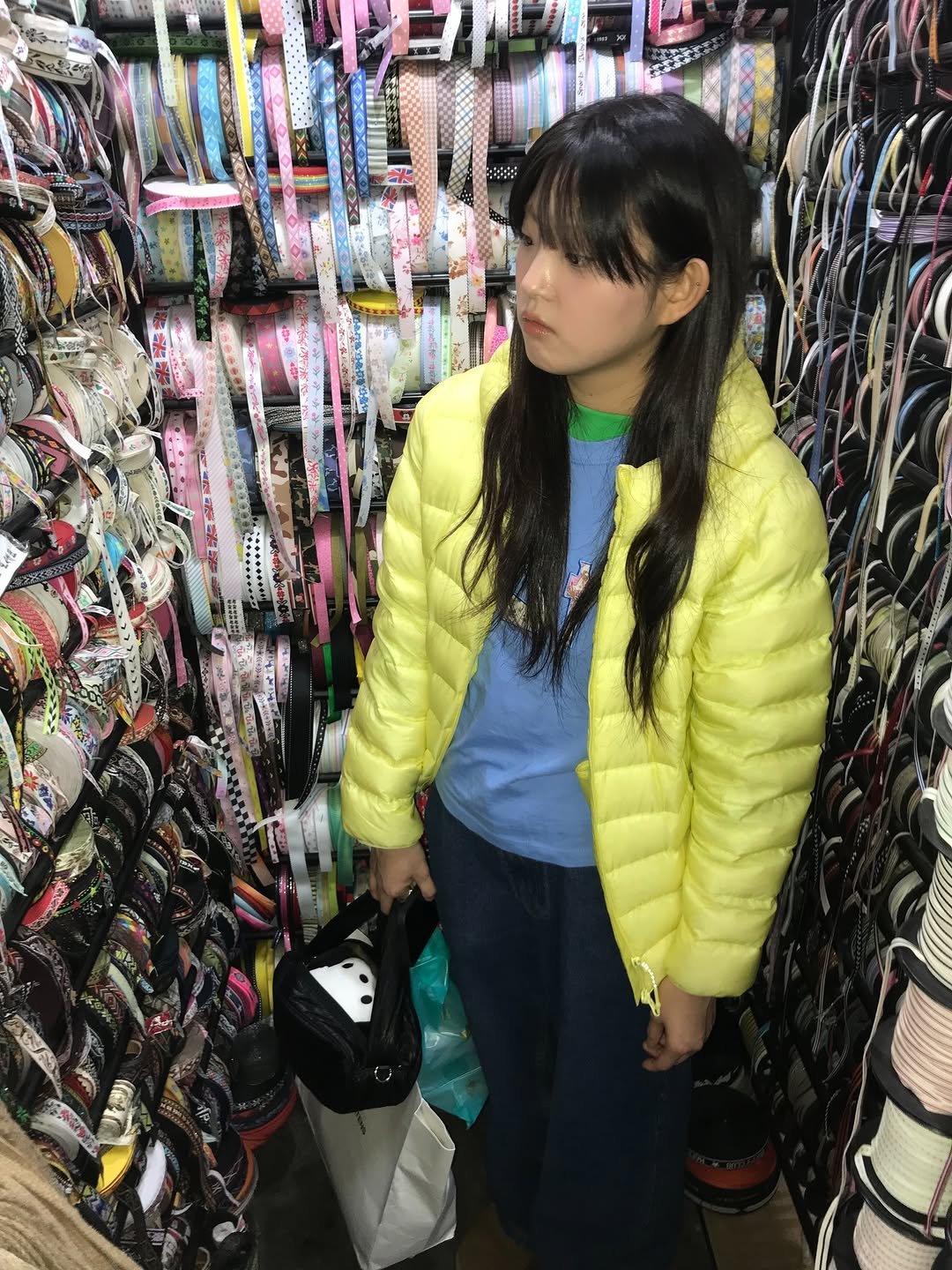 Photo shared by 목지혜 on December 25, 2025 tagging @sunlovetour. May be an image of goosedown coat, clothes hanger, parka and text.