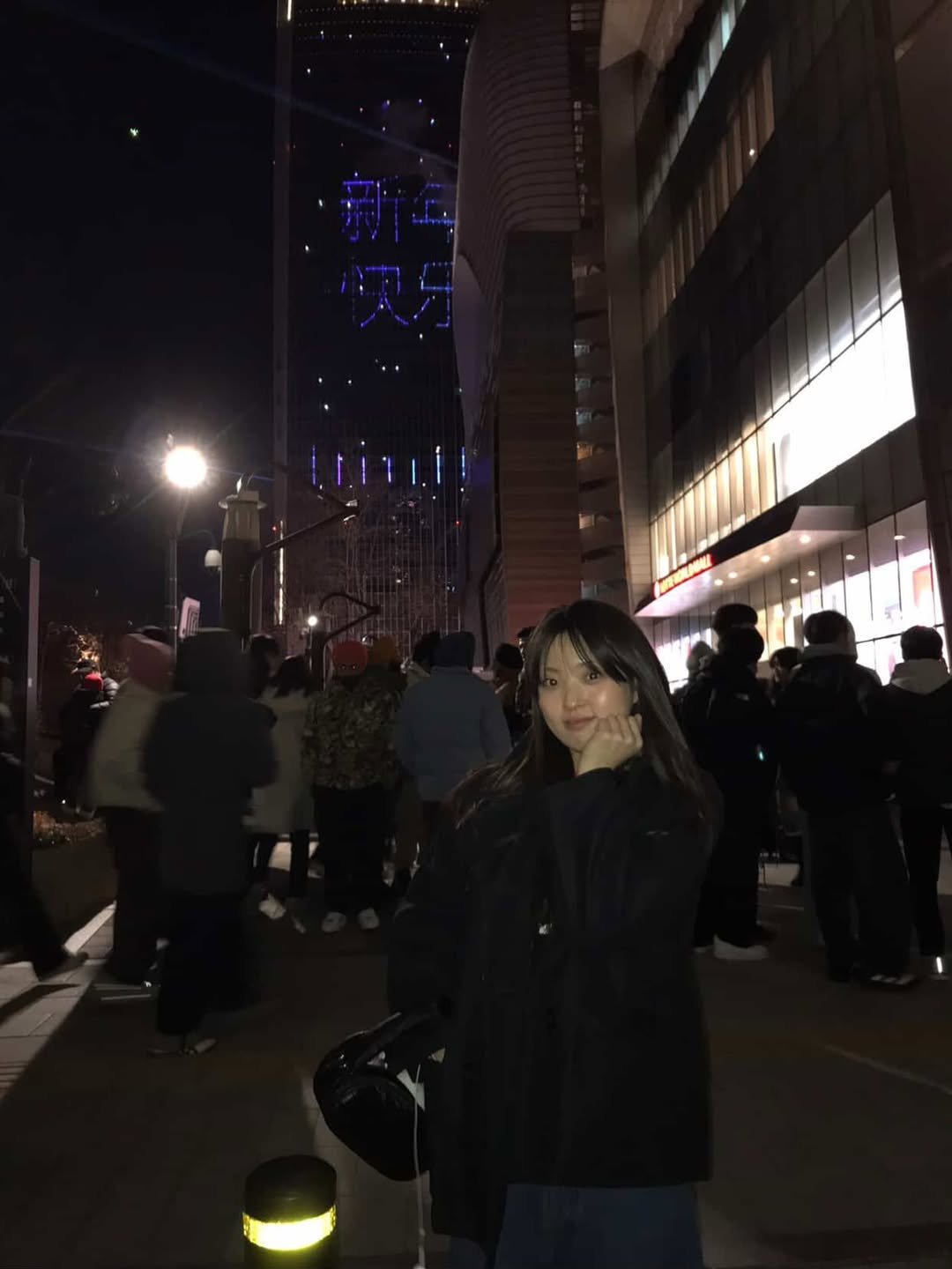 Photo by 목지혜 on January 01, 2026. May be an image of skyscraper, Times Square, the CN Tower, night and text.