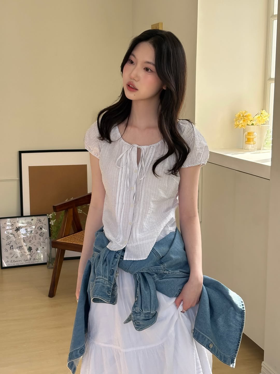 Photo by 여진 on March 13, 2026. May be an image of skirt, top, dress and text.