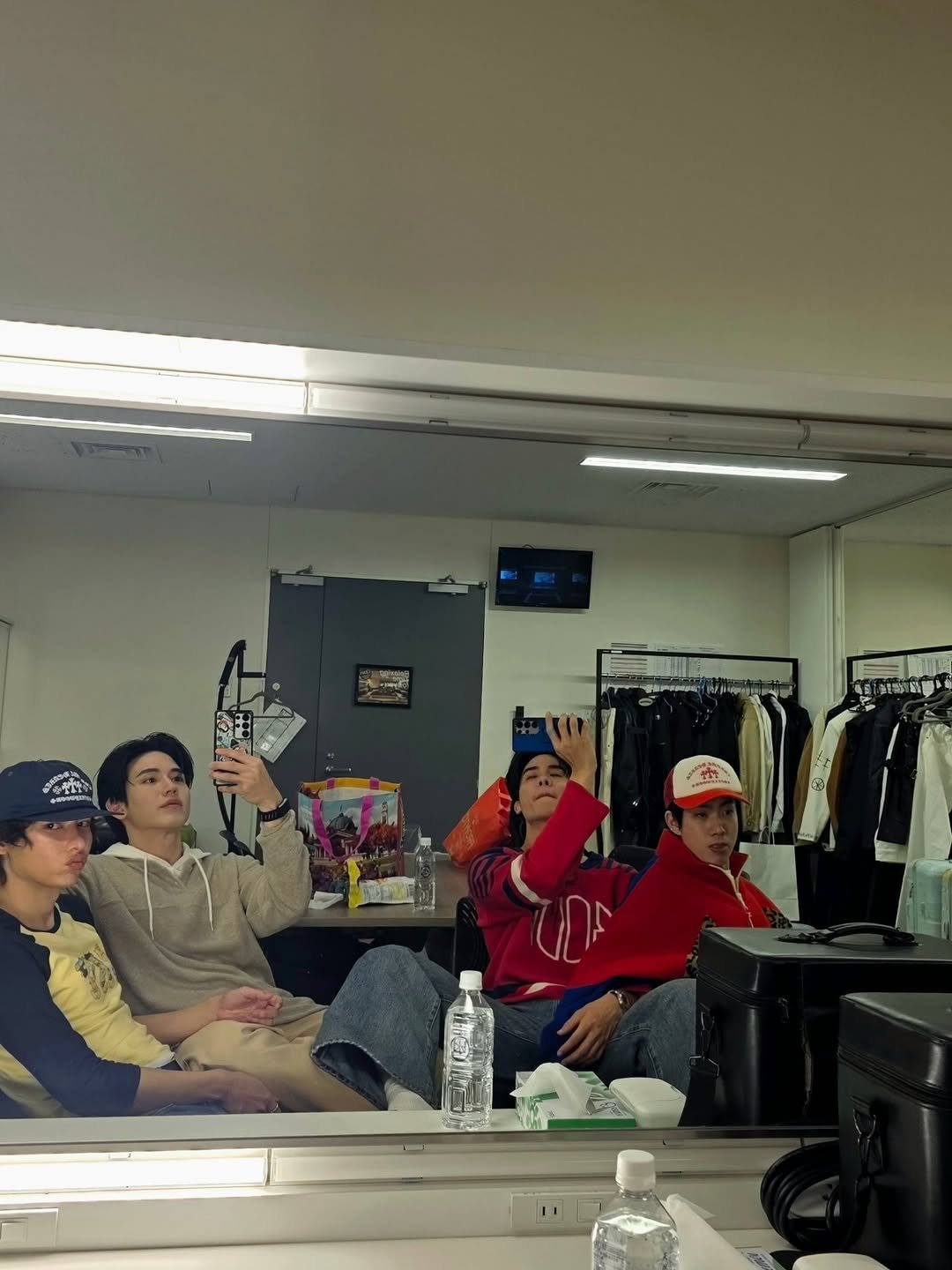 Photo shared by New Thitipoom on February 23, 2026 tagging @tawan_v, @gun_atthaphan, and @tumcial. May be an image of mirror and text.