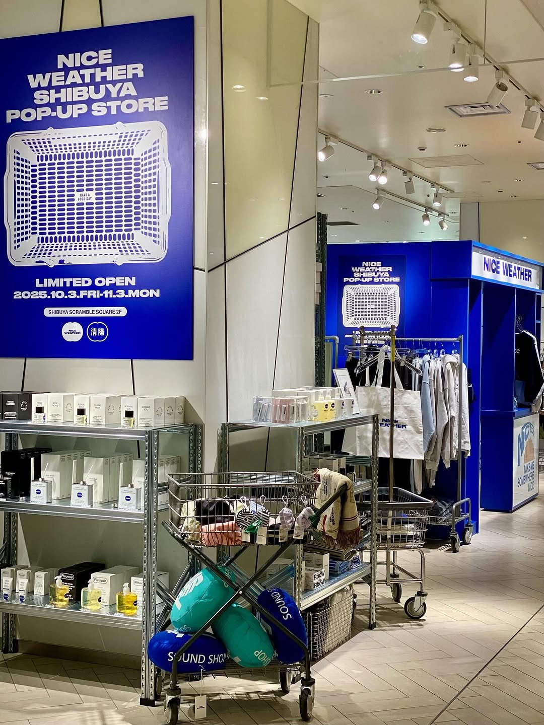 Photo shared by NICE WEATHER / ナイスウェザー on October 02, 2025 tagging @beautyandyouth_official, and @niceweather.seoul. May be an image of shopping cart, rack, cornflower and text.