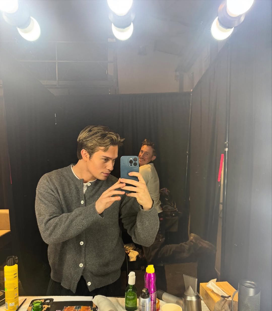Photo shared by Nicholas Galitzine on March 12, 2026 tagging @knightjosh, and @armanibeauty. May be a selfie of one or more people, mirror and text.