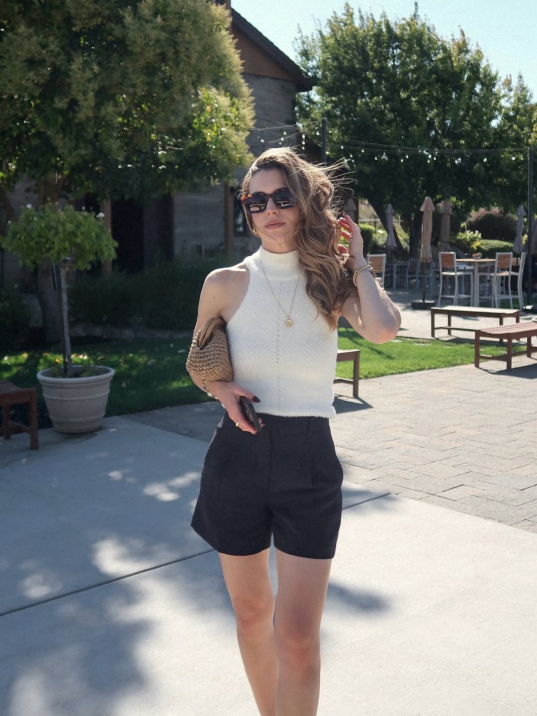 Photo shared by Nichole Ciotti on August 10, 2025 tagging @aritzia, @aweinspired, and @ryansimkhaieyeshop. May be an image of 1 person, shorts, miniskirt and text.