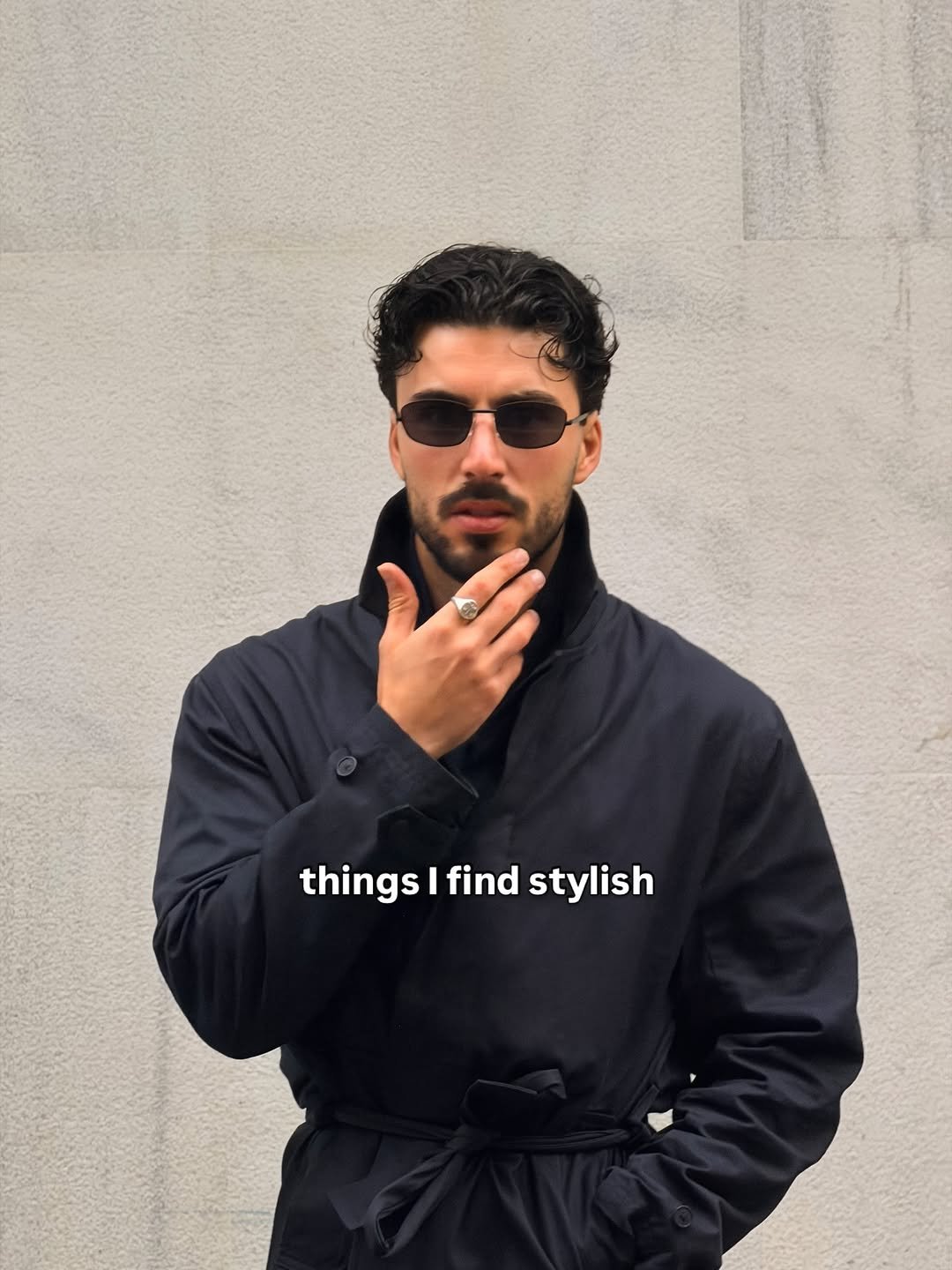 Photo by Nico on February 15, 2026. May be an image of one or more people, beard, duffle coat, overcoat, jacket, raincoat, turtleneck, parka and text that says 'things thingsIfindstylish I find stylish'.