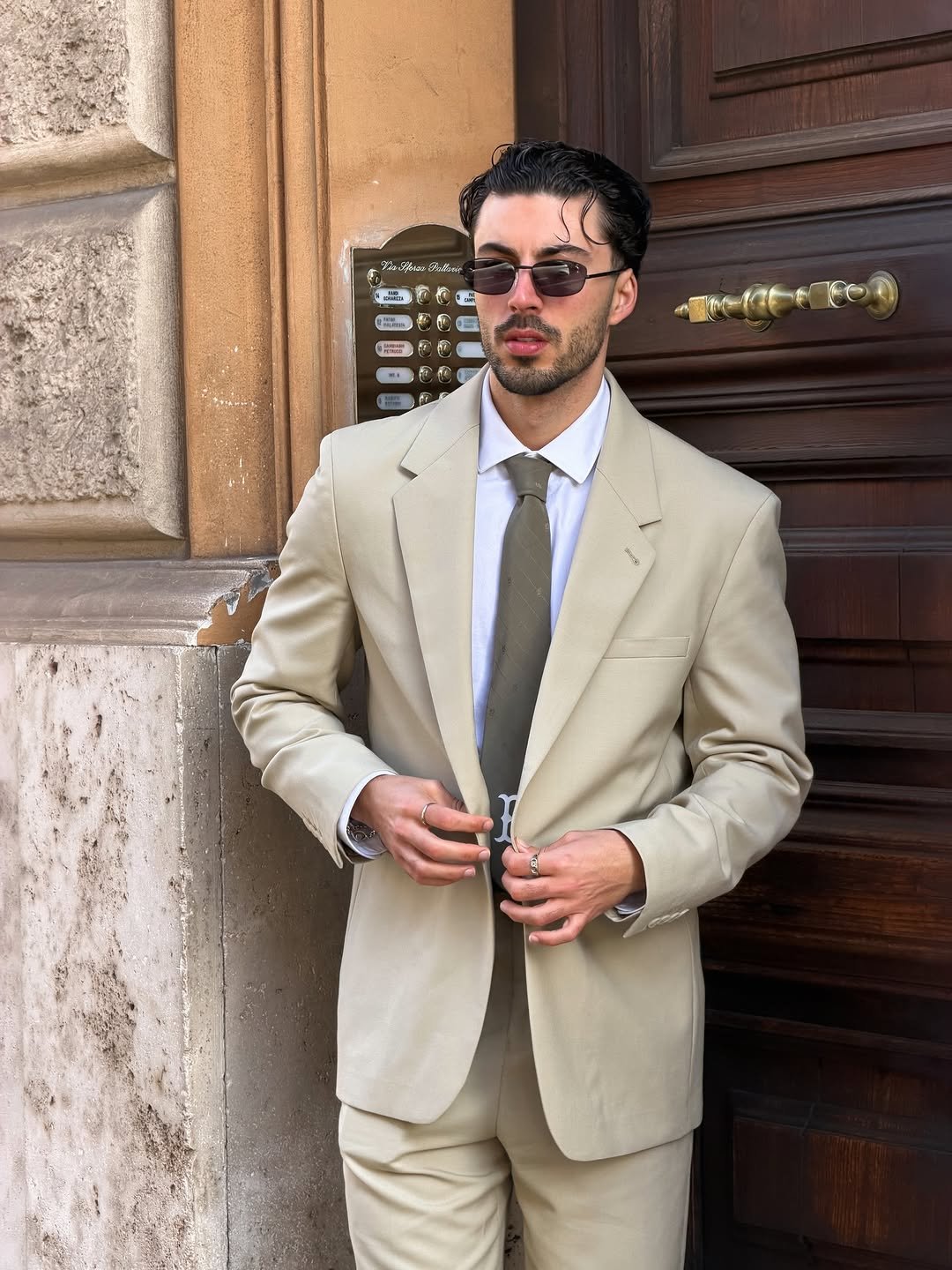 Photo by Nico on April 12, 2026. May be an image of suit, blazer, dinner jacket and text.