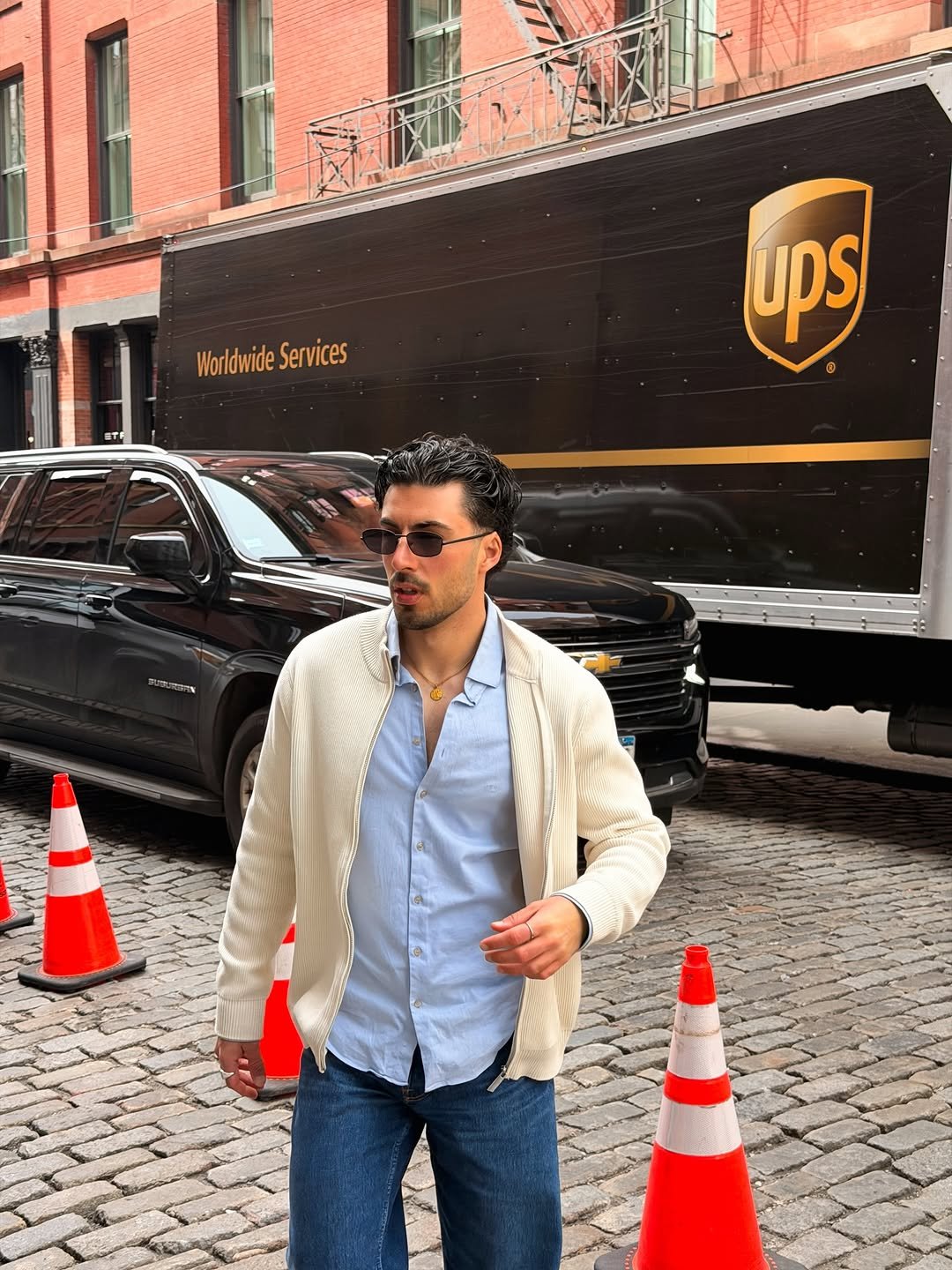 Photo by Nico on April 19, 2026. May be an image of overcoat, blazer and text.