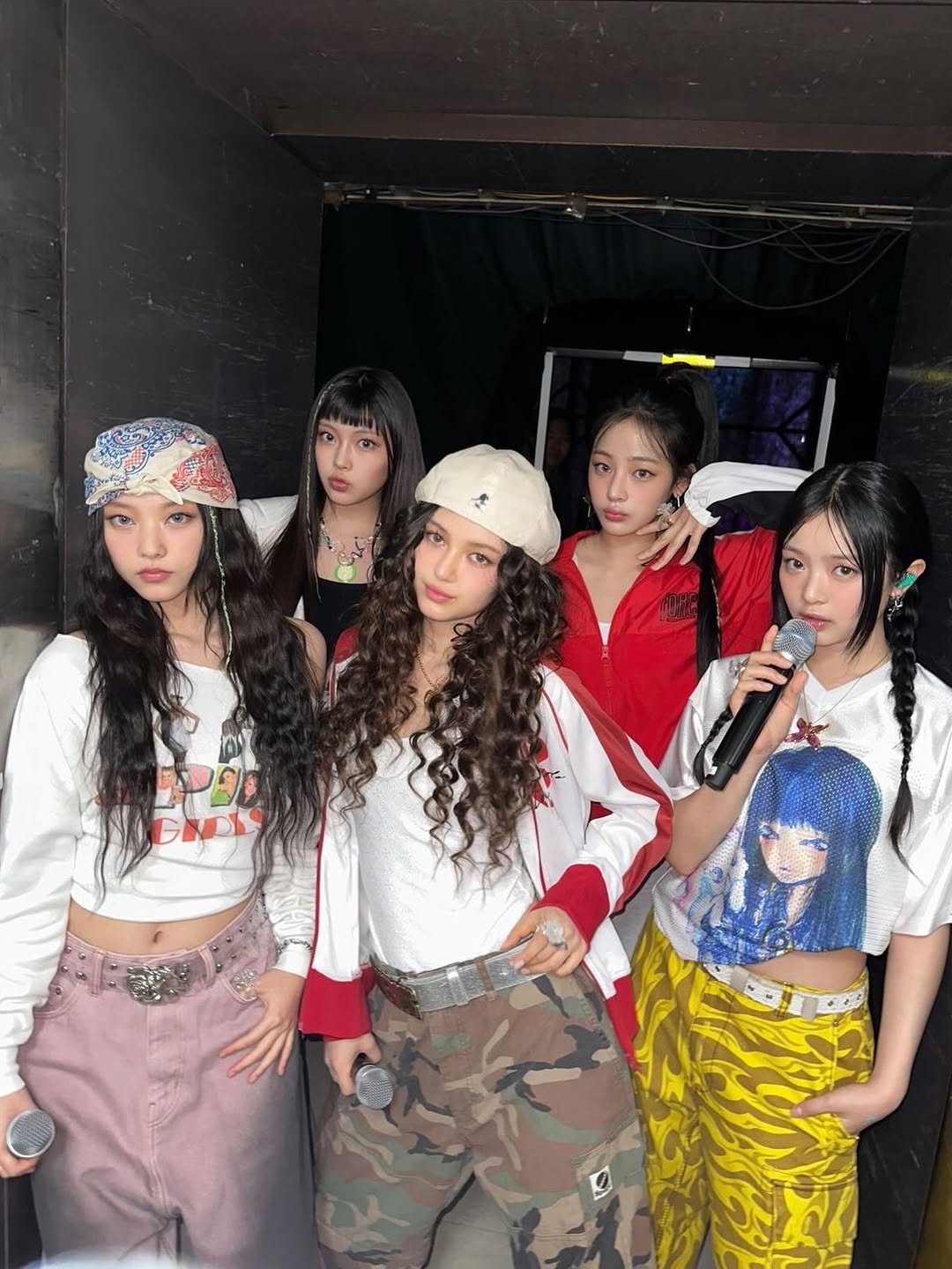 Photo by NJZ HAERIN 해린 on March 27, 2026. May be an image of one or more people, braids, bangs, military uniform, top and text.