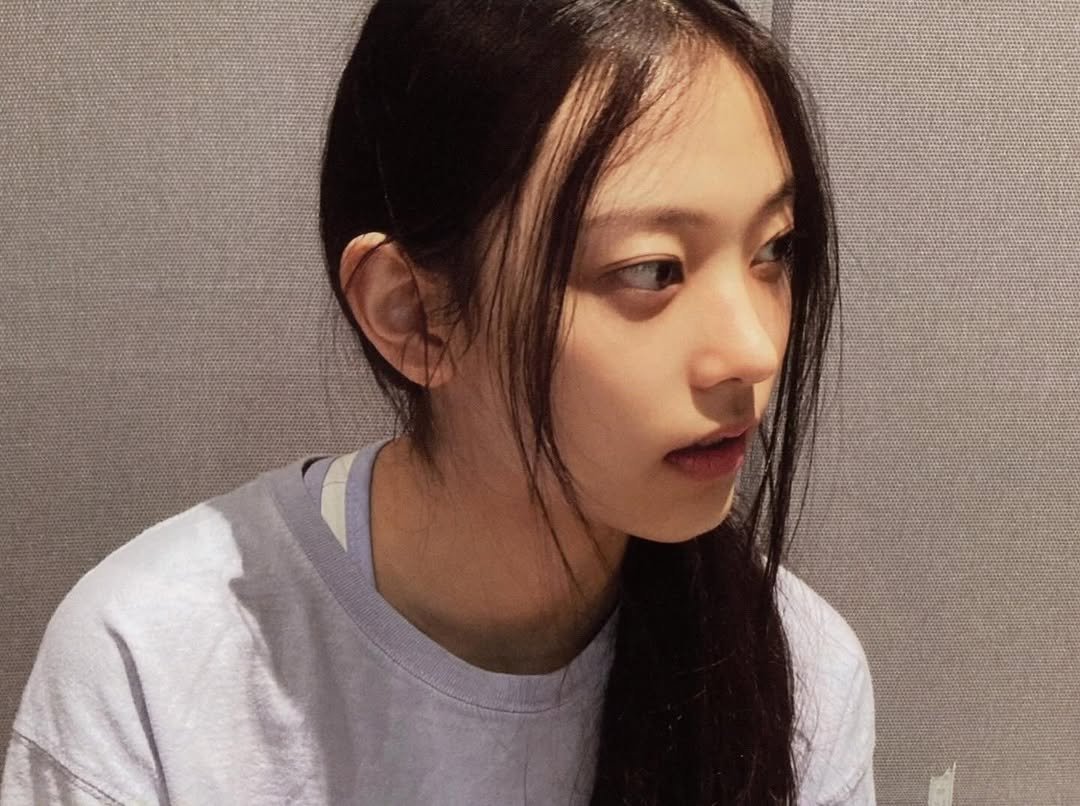 Photo by NJZ HAERIN 해린 on February 15, 2026. May be an image of one or more people, braids, top and text.