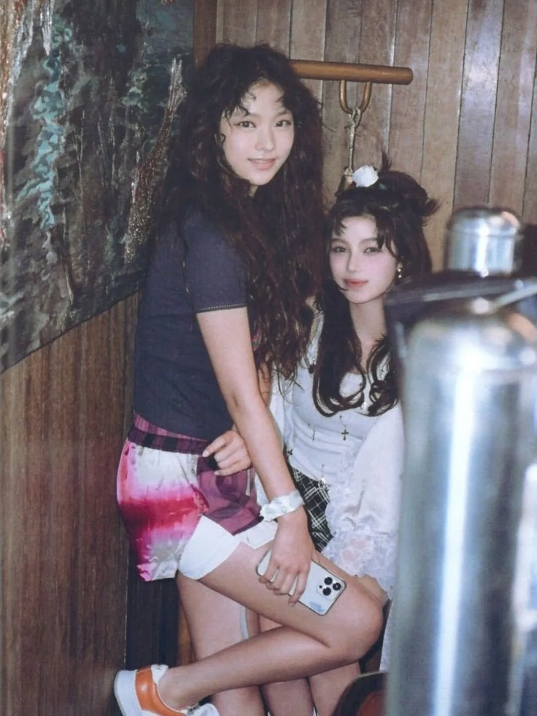 Photo by NJZ HAERIN 해린 on February 10, 2026. May be an image of one or more people, bangs, miniskirt and text.