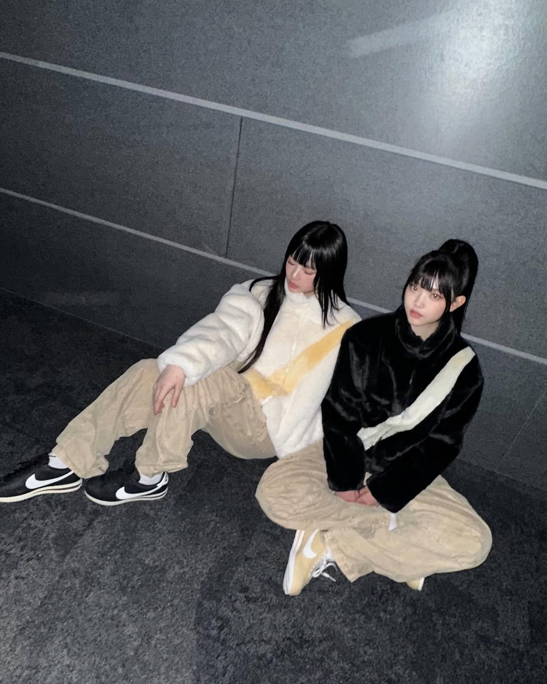 Photo shared by NJZ HAERIN 해린 on March 04, 2026 tagging @hannipampamy. May be an image of one or more people, bangs, duffle coat, parka, night and text.