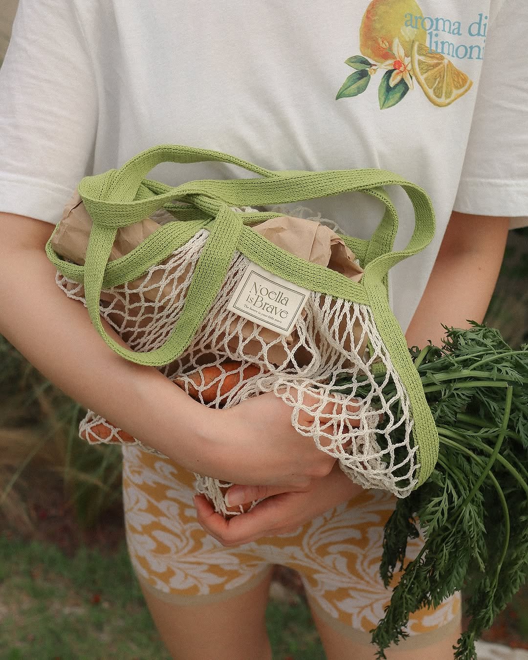 Photo by Noella is Brave on August 13, 2025. May be an image of 1 person, macrame, grocery bag, fishnet stockings and text.