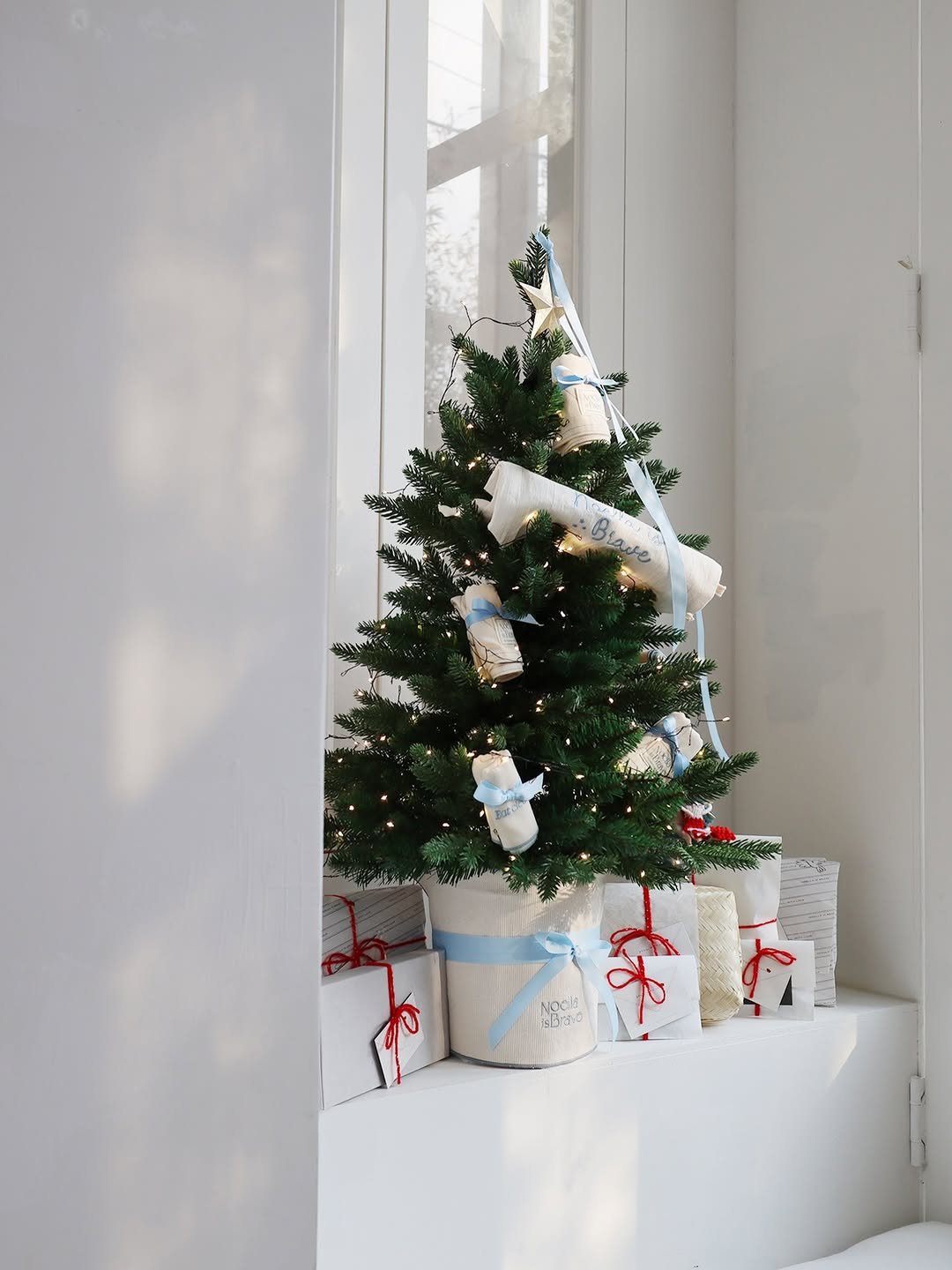 Photo by Noella is Brave on December 14, 2025. May be an image of christmas tree, tinsel, snowman and text.