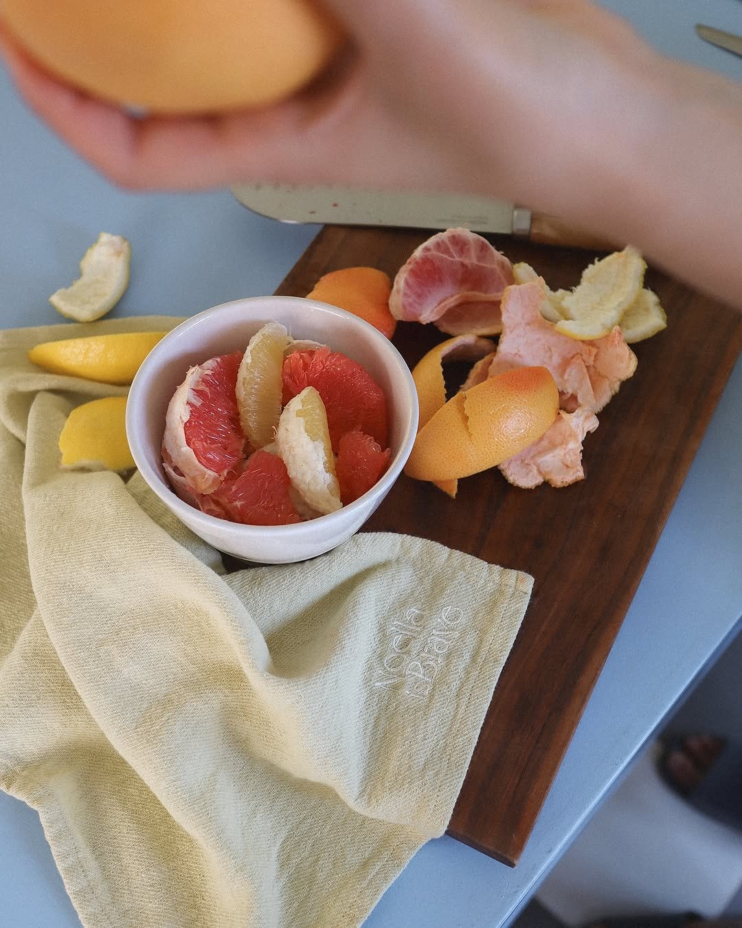 Photo by Noella is Brave on July 22, 2025. May be an image of smoked salmon, salami, napkin, grapefruit, pomelo, fruit cocktail, melon and text.