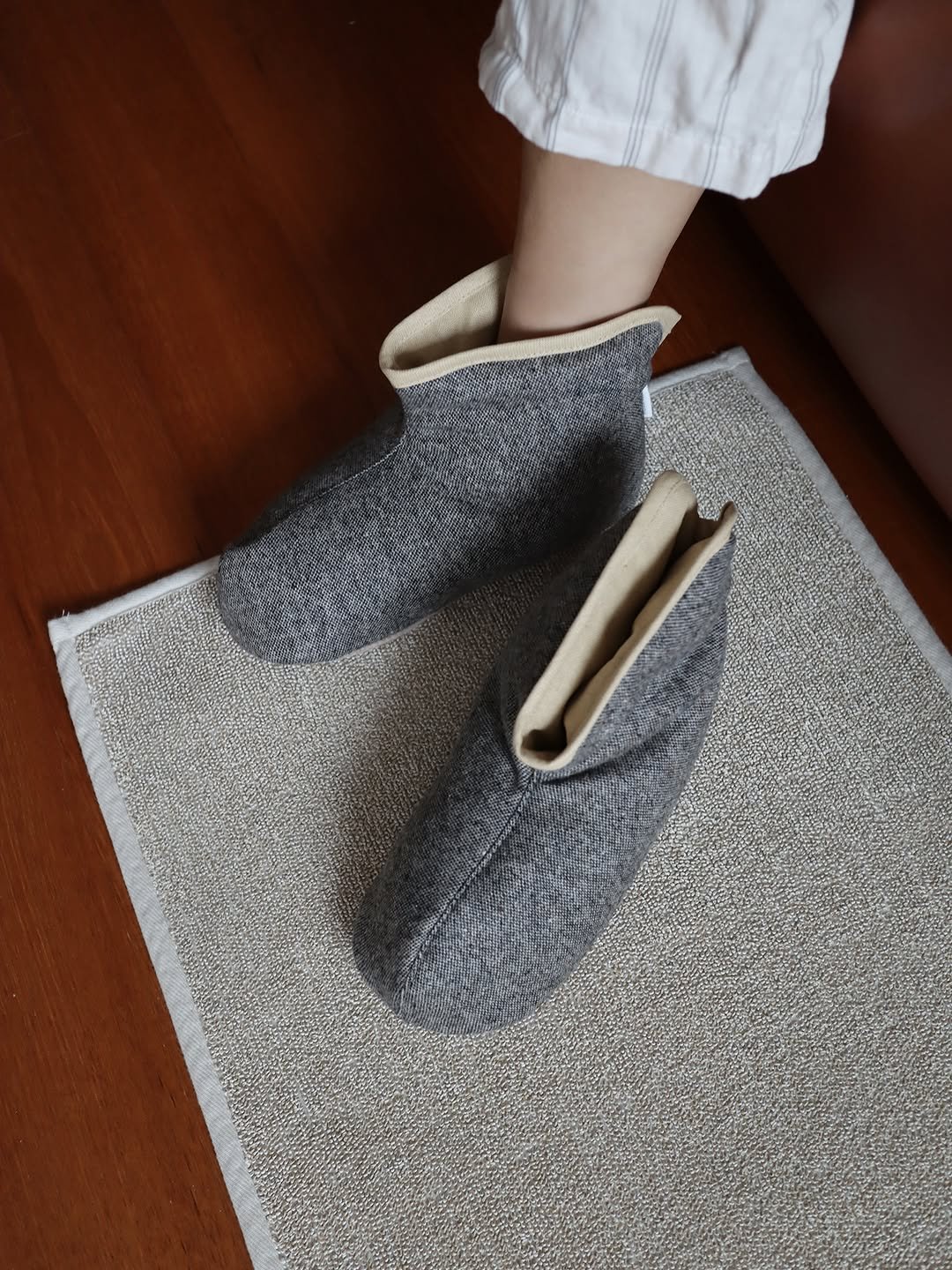 Photo by Noella is Brave on December 28, 2025. May be an image of wool, carpet, sock, bathmat and text.