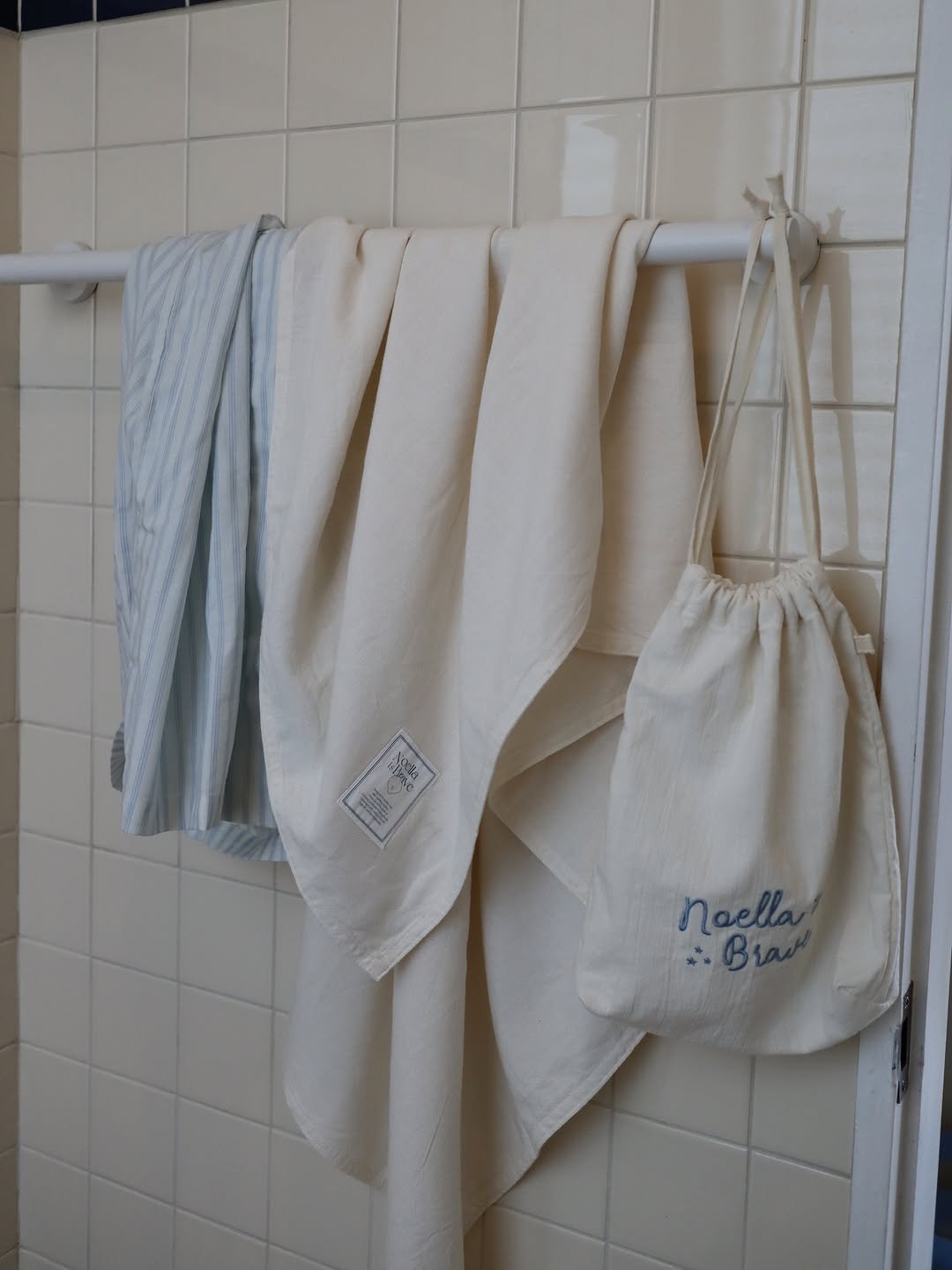 Photo by Noella is Brave on September 09, 2025. May be an image of towel, towel rack, sink, bath robe, grocery bag, bathmat, clothes hanger and text that says 'Naella ..Bra noella Bra :'.