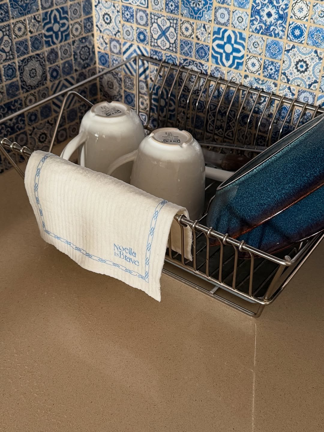 Photo by Noella is Brave on August 24, 2025. May be an image of sink, plate rack, dishwasher, rack, faucet, wash basin, countertop, kitchen and text.