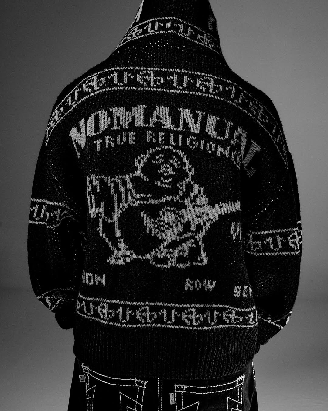 Photo shared by NOMANUAL® on September 14, 2025 tagging @nomanual.designs, and @truereligion.kor. May be a black-and-white image of jacket and text.