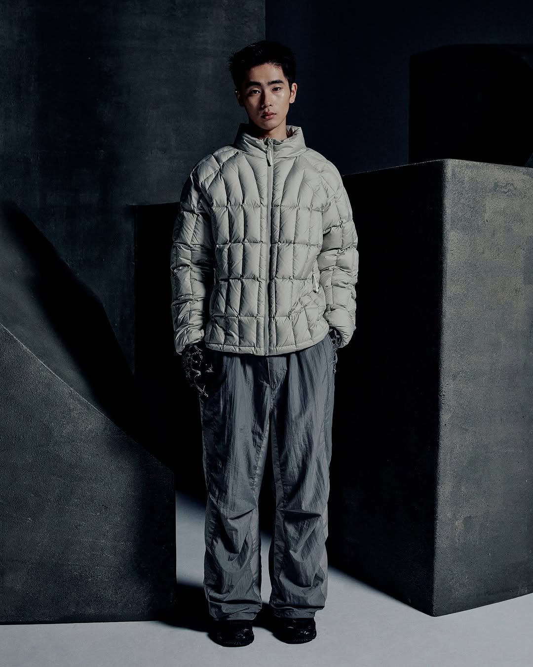 Photo by NOMANUAL® on August 04, 2025. May be an image of 1 person, duffle coat, goosedown coat, overcoat, parka, snowsuit and text.
